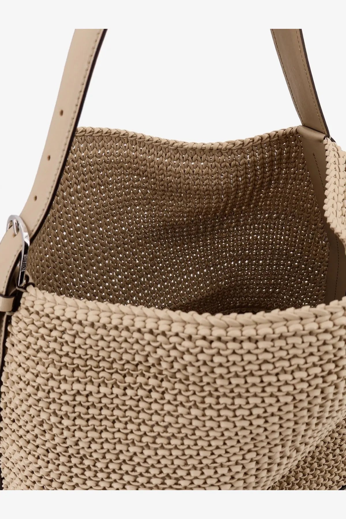 Beige woven straw tote bag with leather straps and silver-tone hardware from Toteme women’s leather shoulder bag collection