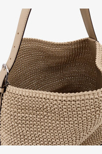 Beige woven straw tote bag with leather straps and silver-tone hardware from Toteme women’s leather shoulder bag collection