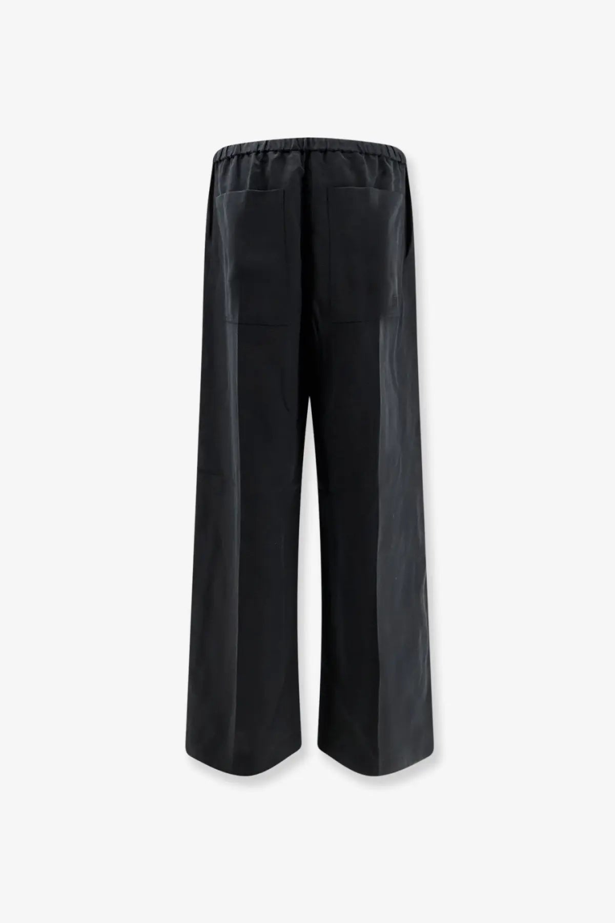 Back view of toteme womens black linen and lyocell blend wide-leg trousers with elastic waistband and two rear pockets