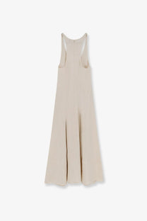 Beige sleeveless midi cotton dress by Toteme with a subtle pleated hem and minimalist design