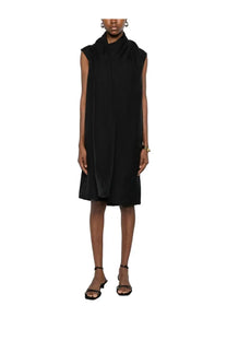 Toteme women’s black midi dress with sleeveless design, draped high neck collar, and flowing fabric in scarf style