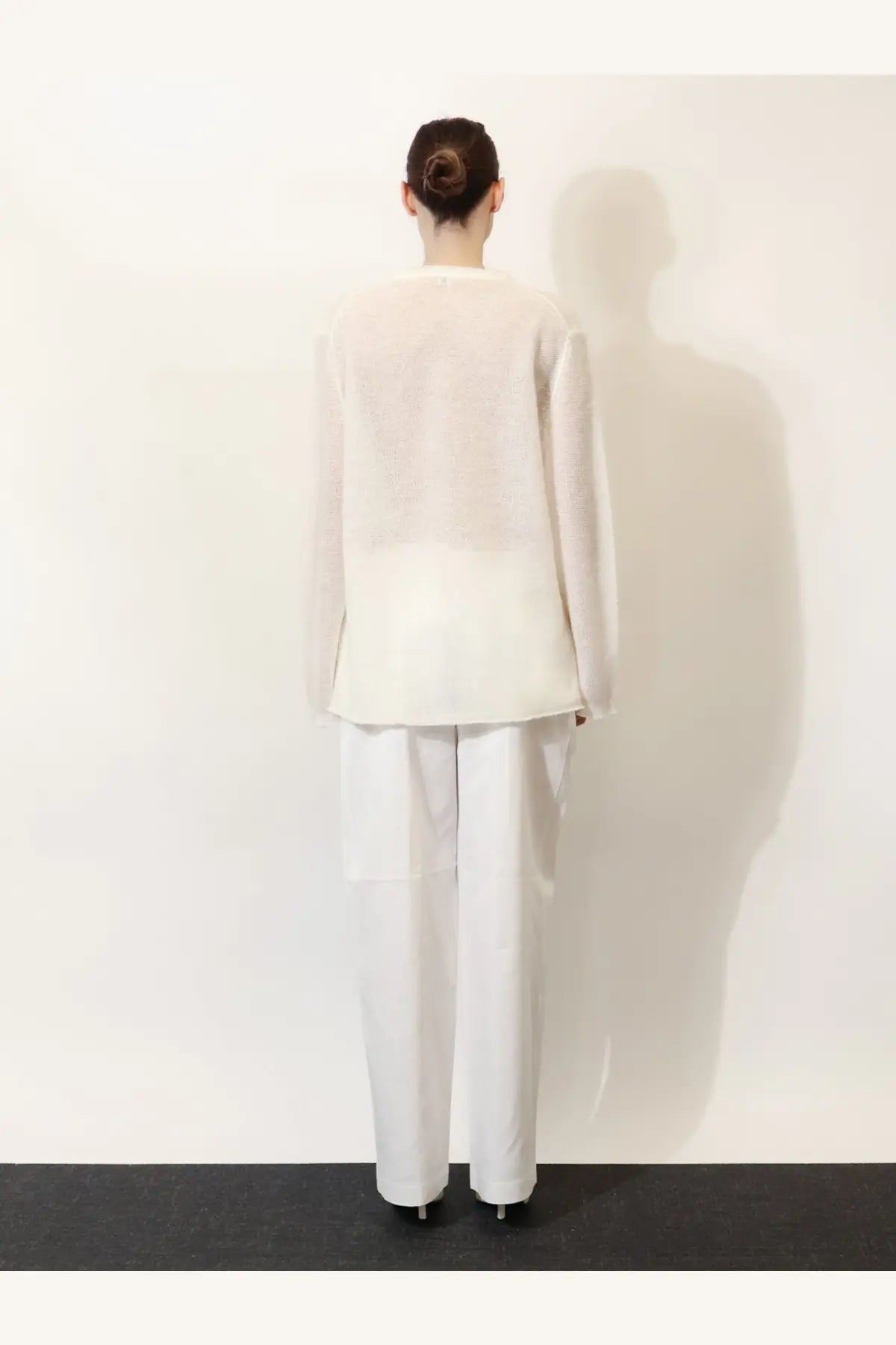 Toteme women’s white mohair and wool blend sweater with a minimalist long-sleeved design and soft sheer fabric