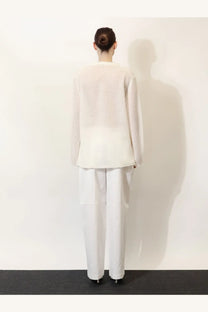 Toteme women’s white mohair and wool blend sweater with a minimalist long-sleeved design and soft sheer fabric