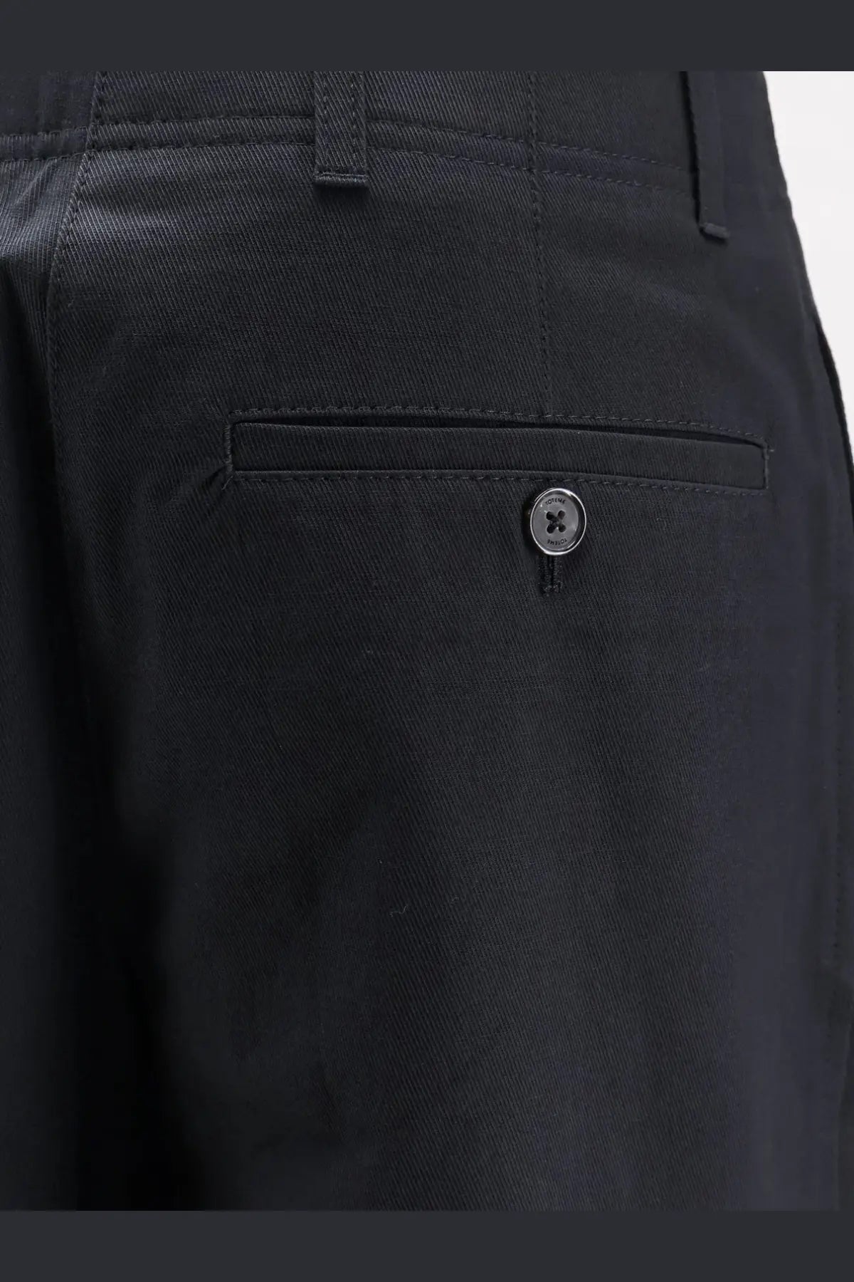 Toteme women’s relaxed black cotton chino trousers with subtle twill weave and single button front pocket closure