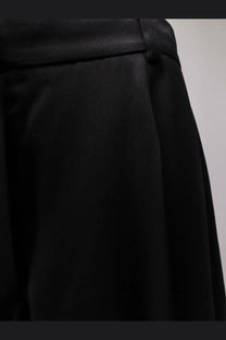 Toteme women’s black satin trousers with a smooth glossy finish and structured waistband in satin material