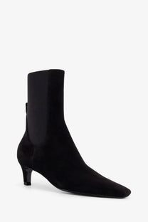 Toteme women’s black suede ankle boot with sleek pointed toe and low heel for stylish everyday wear