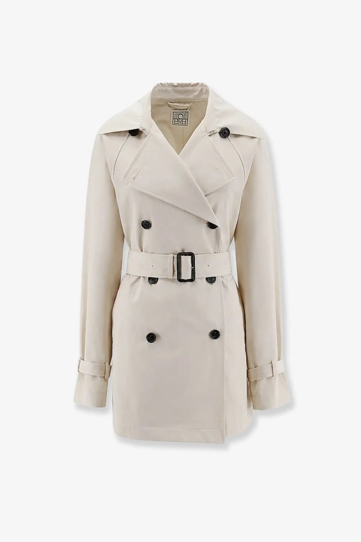 Toteme women’s trench coat in beige washed cotton with double-breasted black buttons and matching belt