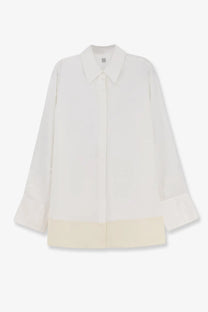 Toteme women’s tuxedo satin viscose white shirt with minimalist design and cream-colored hem and cuffs in lightweight fabric