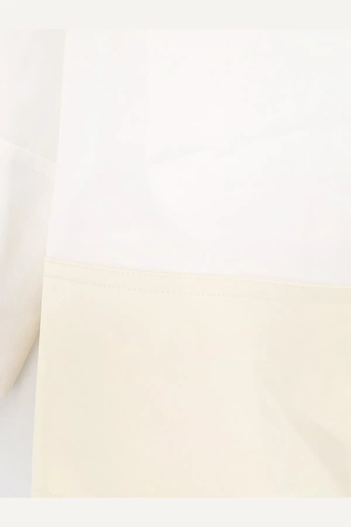 Toteme women’s tuxedo satin viscose shirt white featuring soft cream fabric with smooth texture and subtle hem stitching
