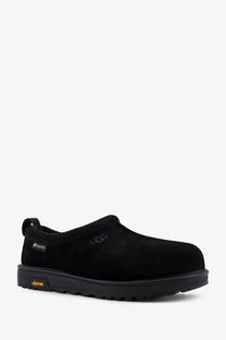 Ugg men’s tasman gtx suede slip black slip-on shoe with black suede upper and rubber sole front view