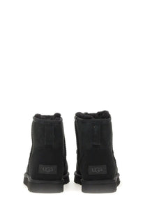 Ugg women’s boot classic mini black black booties with plush lining and matte finish for cozy wear