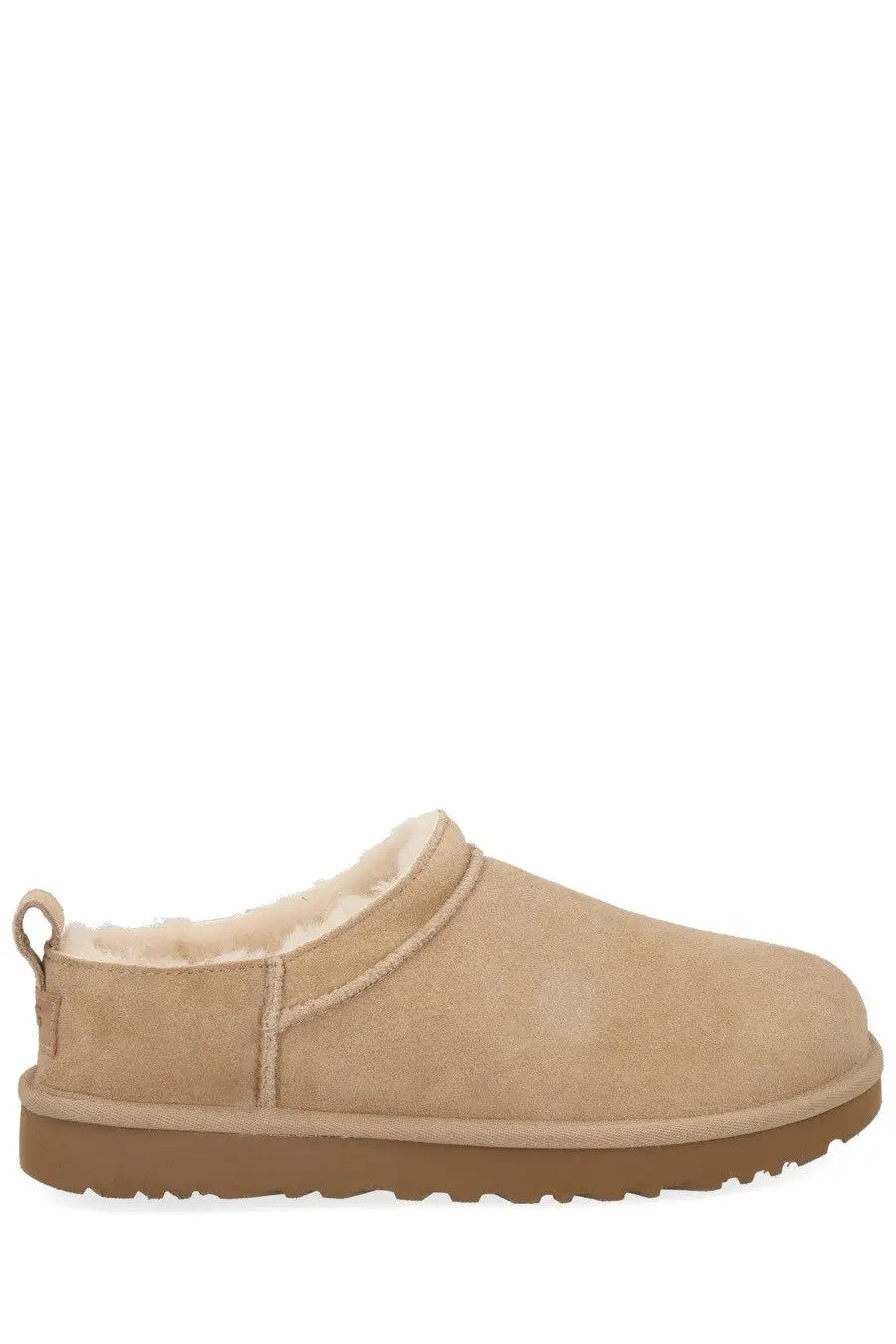 Ugg women’s classic micro boots in beige suede slip-on mule style with plush shearling lining and tan rubber sole