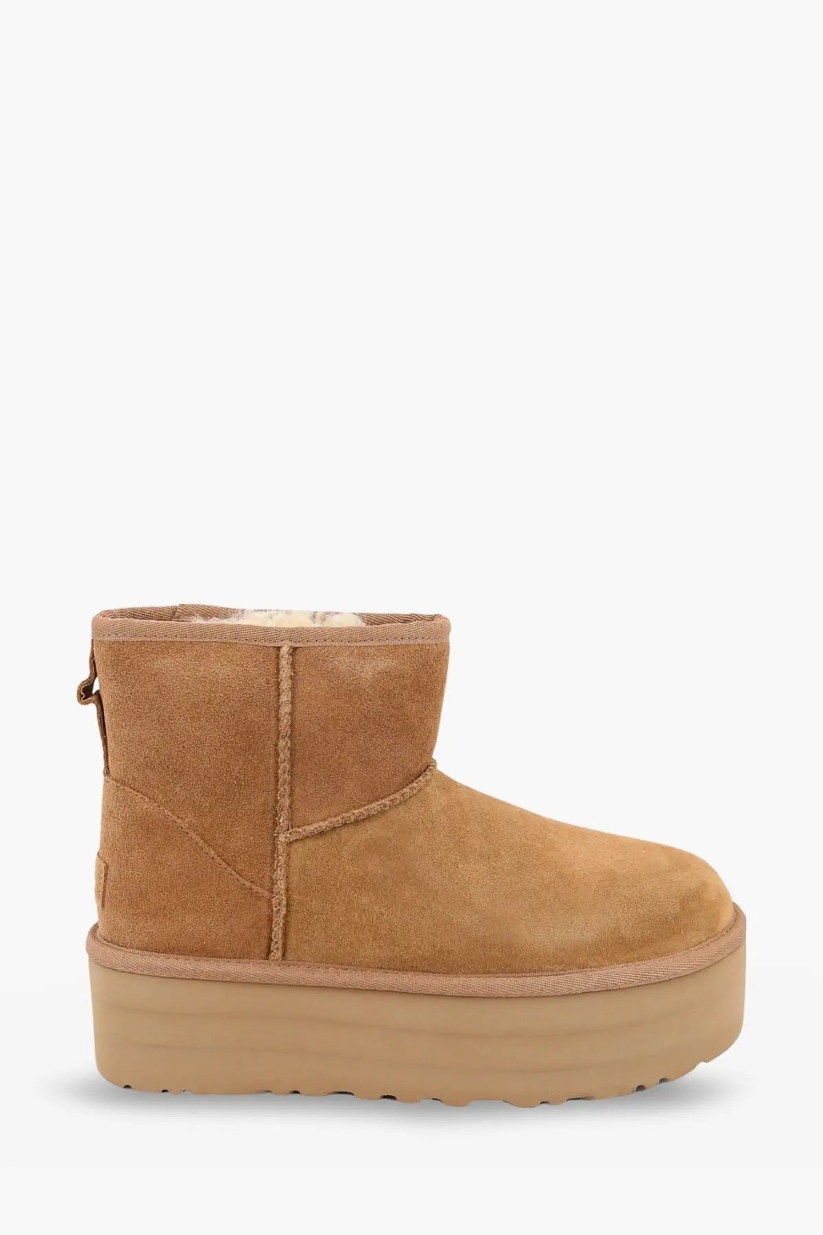 Ugg women’s classic mini platform tan suede ankle boots with plush shearling lining and chunky rubber sole