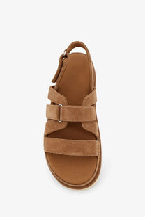 Ugg women’s goldenstar gleam sandals in suede brown with tan suede strap platform sole and adjustable ankle buckle