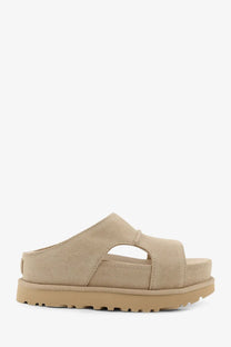 Beige suede slide sandal with chunky rubber sole from UGG women’s Goldenstar collection