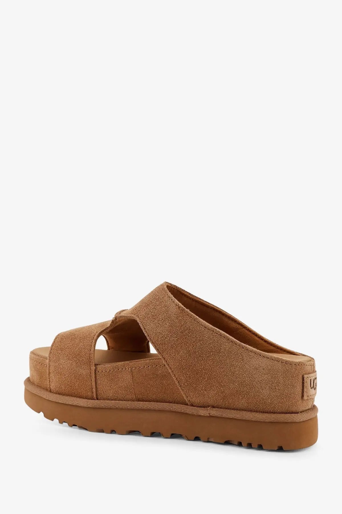Ugg womens goldenstar tan suede slide sandal with chunky rubber sole in brown shown from the back side
