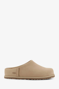 Beige ugg women’s nubuck sandals with a soft leather upper and durable rubber sole for comfortable wear