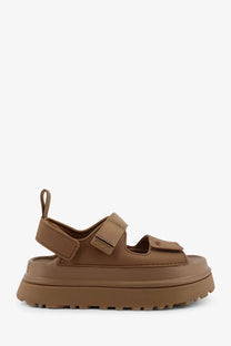 Ugg women’s brown rubber platform sandal with thick sole and adjustable velcro straps