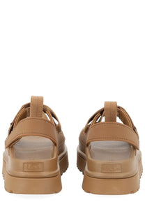 Ugg women’s sandal goldenglow brown with tan chunky soles and adjustable straps for casual wear