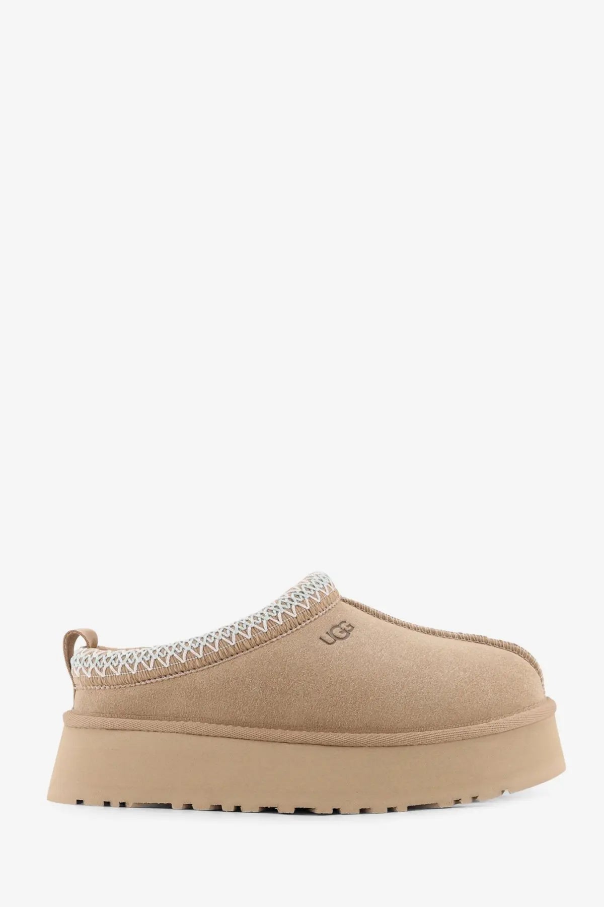 Beige UGG women’s Tazz suede platform slip-on mule with textured upper and white zigzag trim