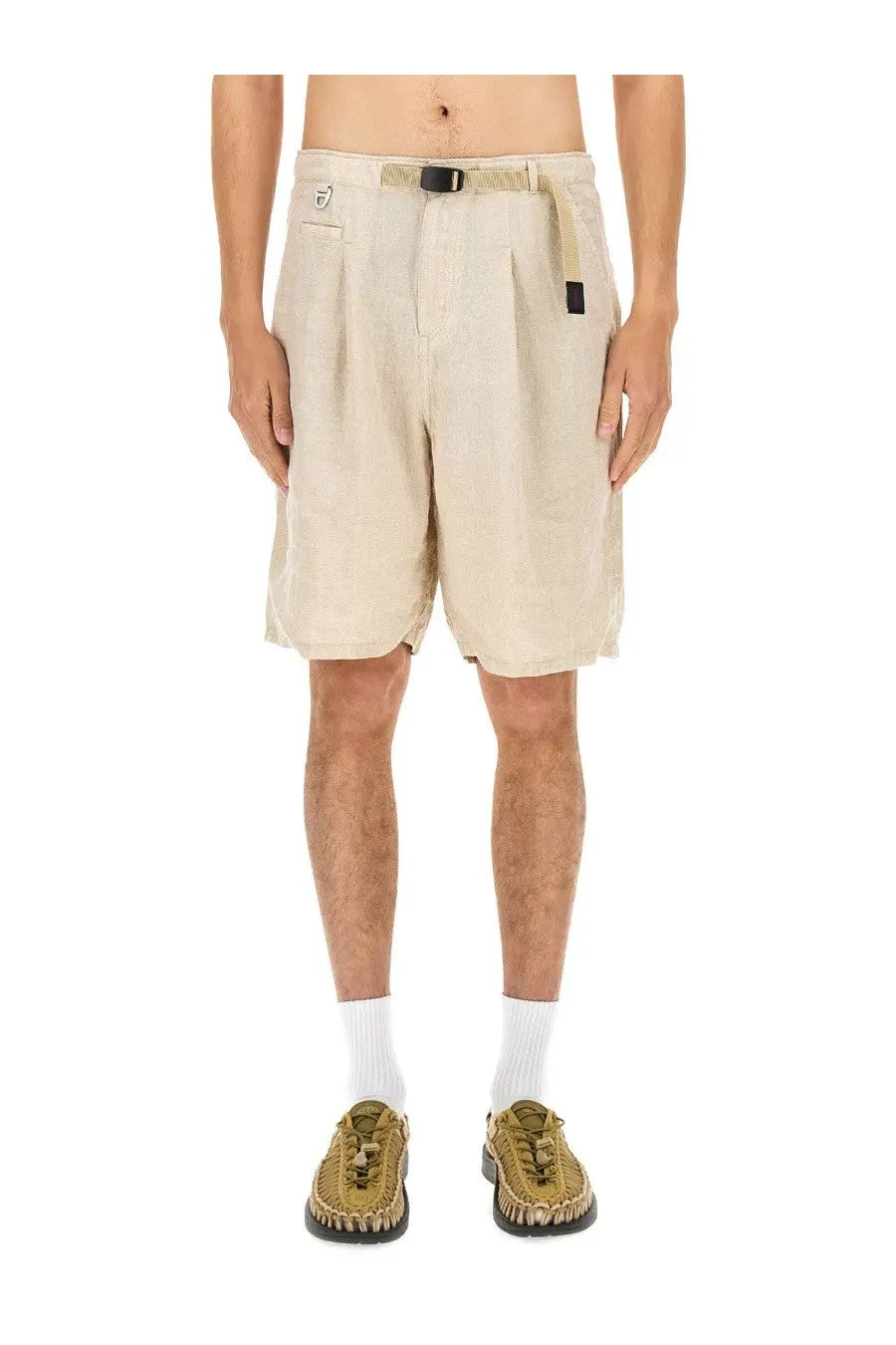 Beige linen men’s shorts by undercover with pleats and matching belt featuring a black buckle