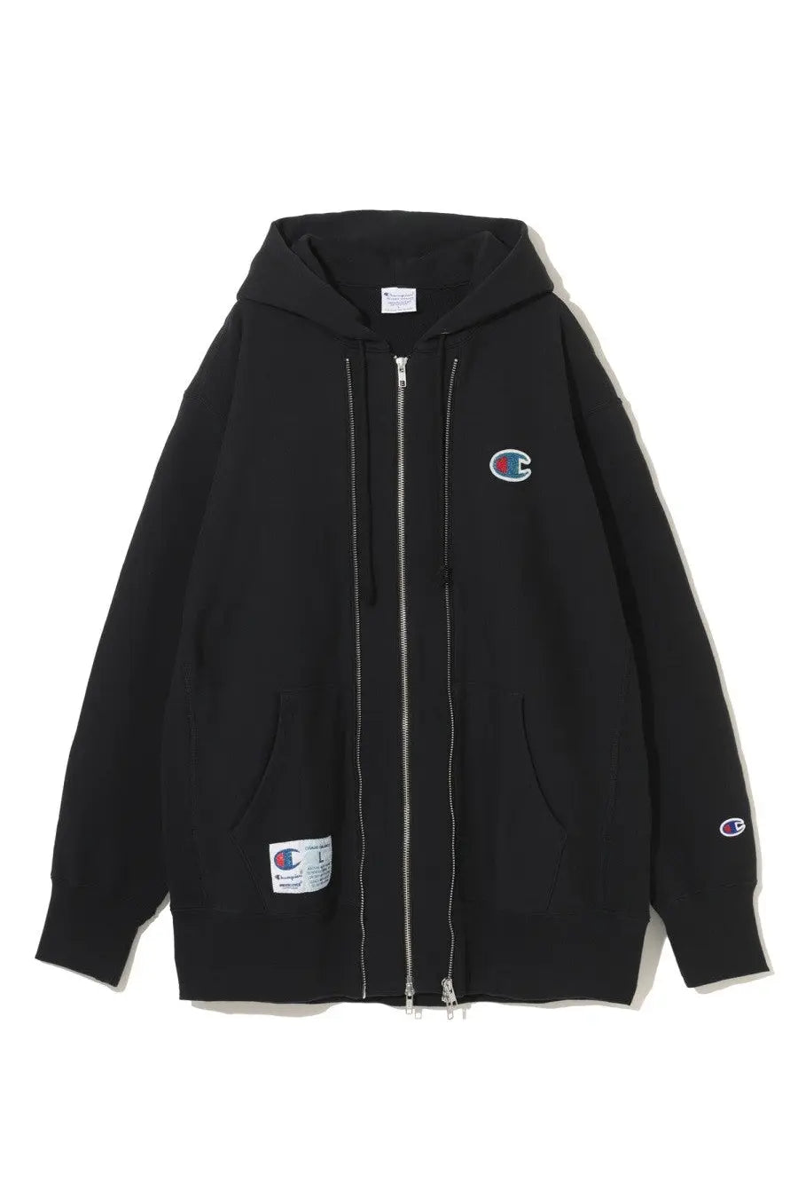 Black champion zip-up hoodie with embroidered logos on chest and sleeve, front zipper, and side pockets undercover unisex sweatshirt