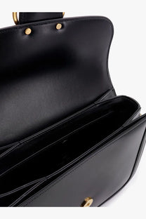 Valentino men’s black leather shoulder bag with gold-tone hardware and structured interior for daily use