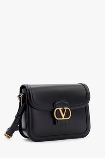 Black leather valentino garavani rockstud crossbody shoulder bag with gold-tone hardware for men