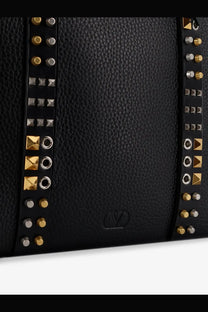 Valentino men’s black leather shoulder bag with gold and silver toned studs in vertical rows along sides