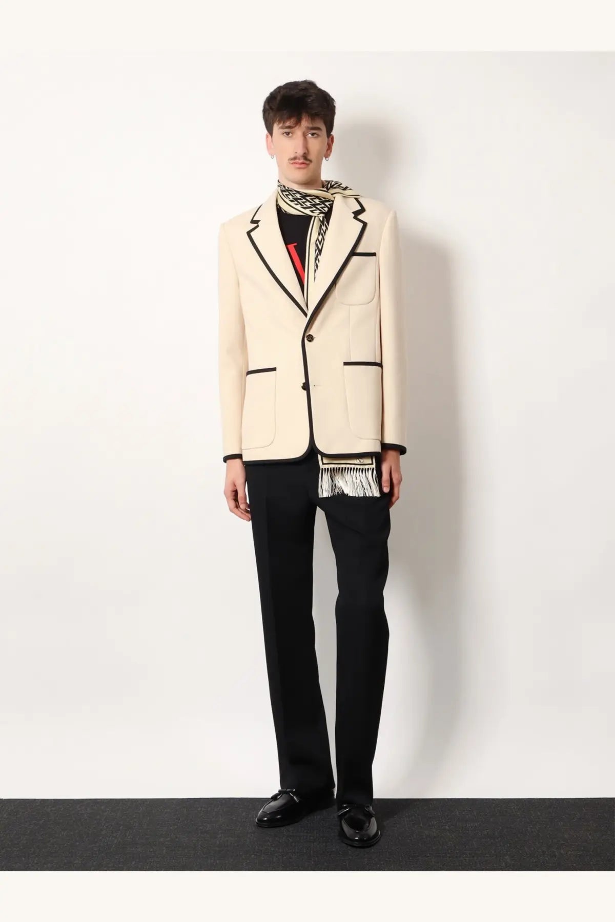 Valentino men’s single breasted virgin wool blazer in cream with black trim and two-button closure