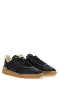 Valentino men’s upvillage sneaker black leather with tan rubber sole and perforated detailing