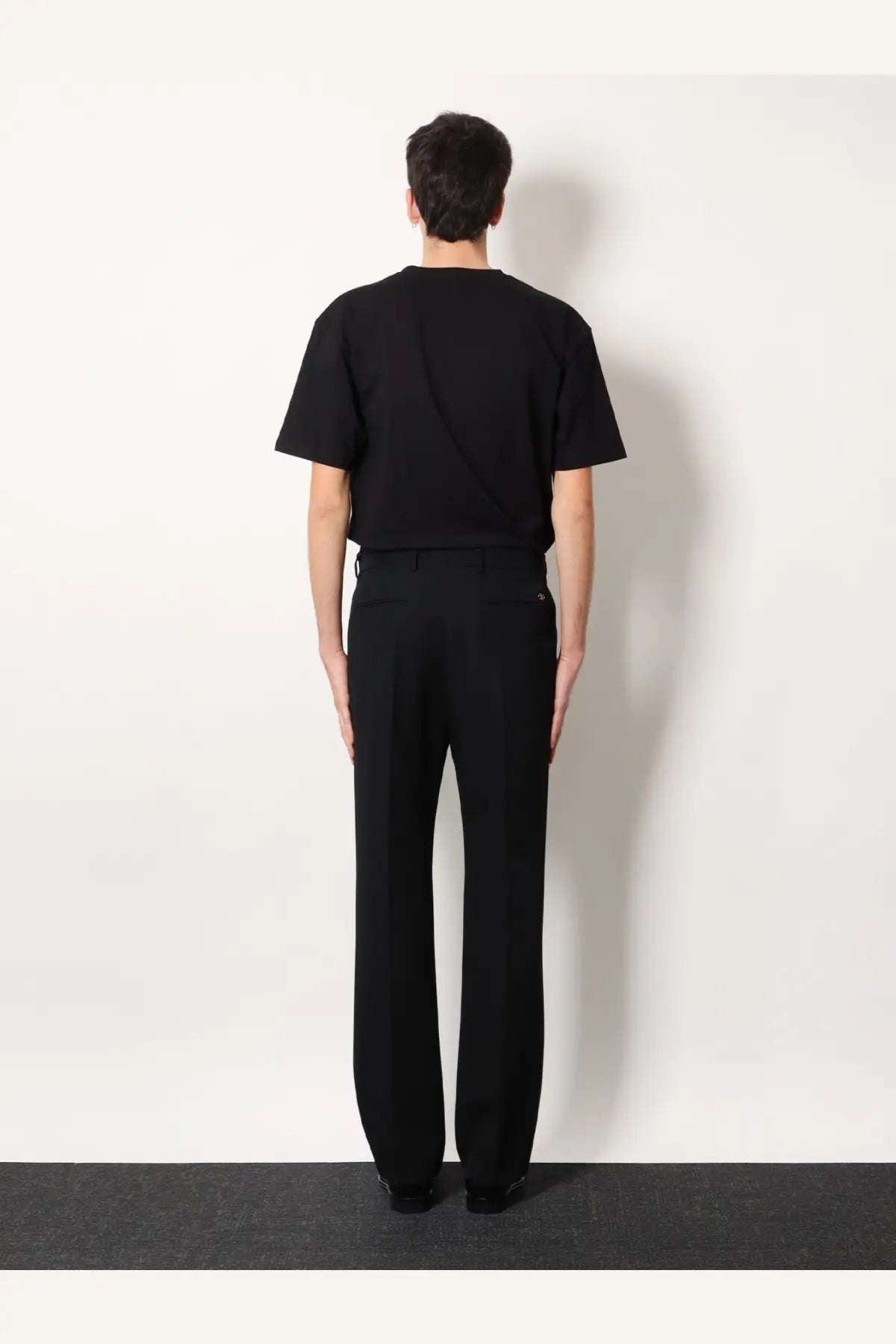 Valentino men’s virgin wool black tailored trousers with a straight-leg cut and subtle side pockets