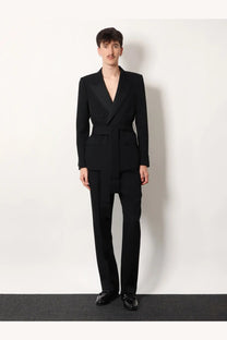 Black tailored suit with belted waist and notched lapels paired with valentino men’s virgin wool trousers black