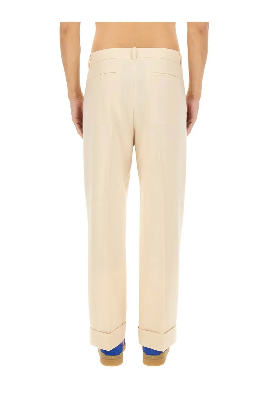 Beige straight-leg valentino men’s wool pants with a clean tailored fit and rolled cuffs