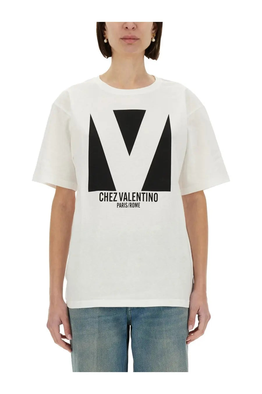 Valentino women’s white cotton t-shirt with bold black geometric v logo and chez valentino paris rome text print