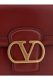Valentino women’s leather shoulder bag in rich burgundy with a gold-tone Valentino logo clasp