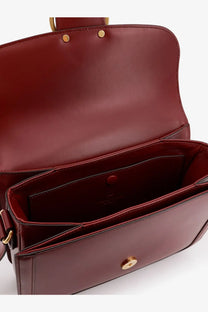 Valentino women’s leather shoulder bag brown in rich burgundy leather with gold tone hardware and minimalist design