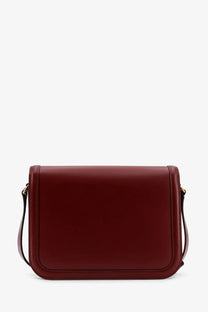 Valentino women’s leather shoulder bag in sleek burgundy leather with minimalist design and gold-tone hardware