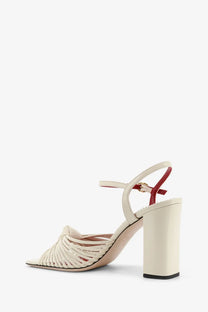 Valentino women’s cream-colored leather sandals with chunky block heel and red accent strap white design