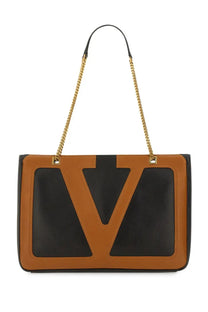 Valentino women’s viva superstar medium shopping bag black with brown and black leather and gold-tone chain strap