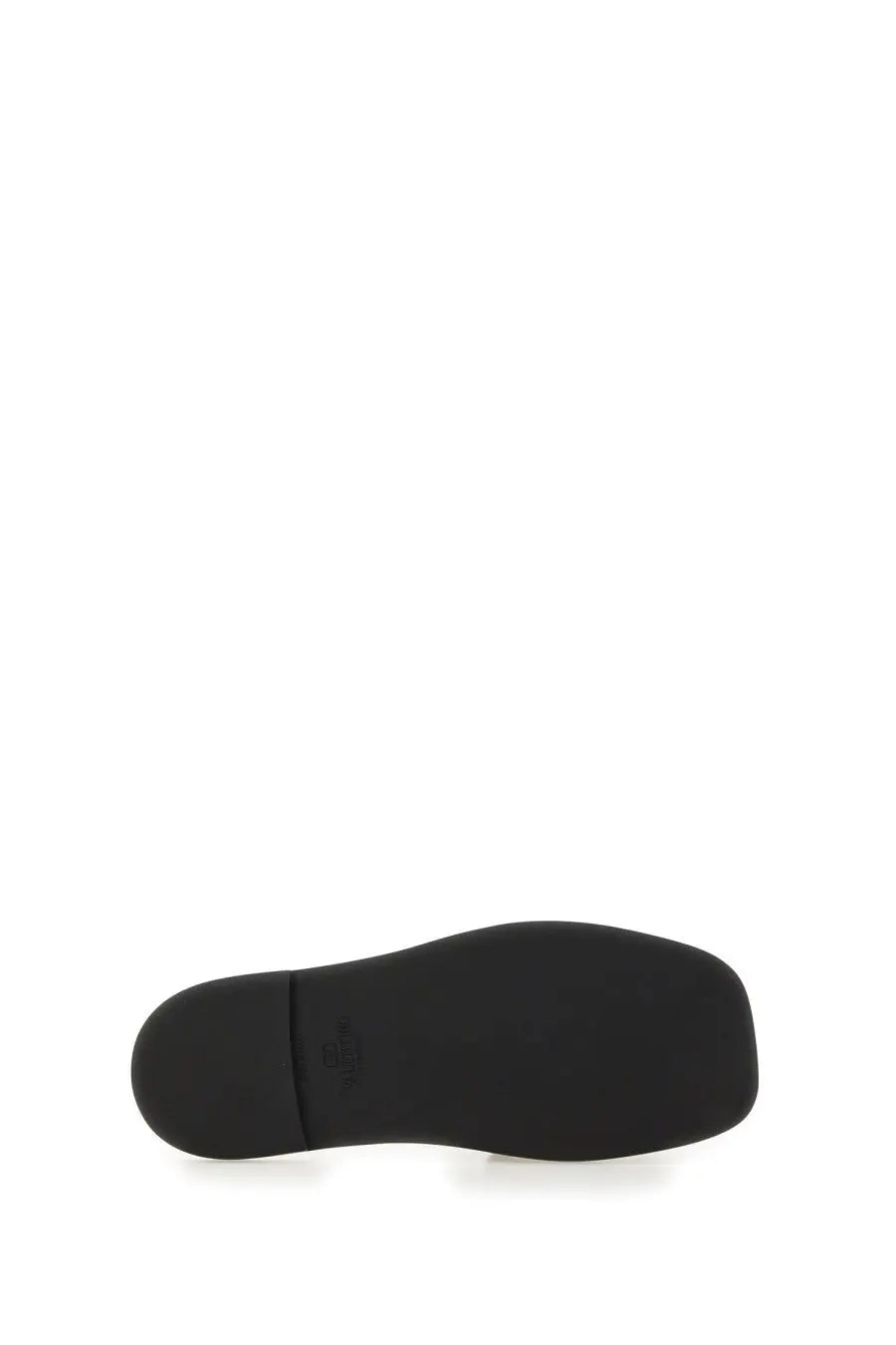 Black rubber sole with subtle seam and embossed logo near heel of valentino women’s viva superstar slide sandal multicolor back side