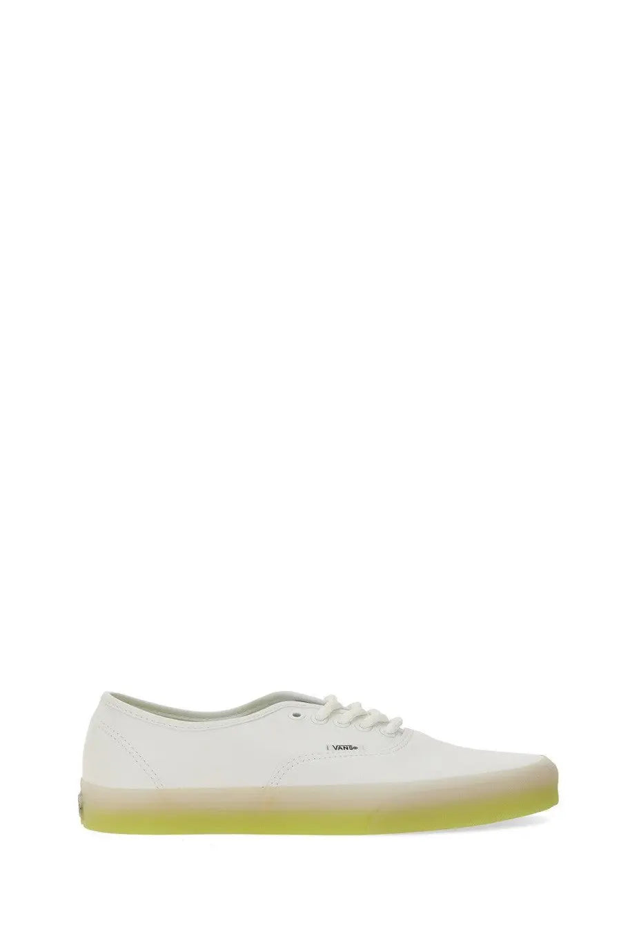 Vans men’s authentic sneaker white canvas with a translucent lime green rubber sole side view