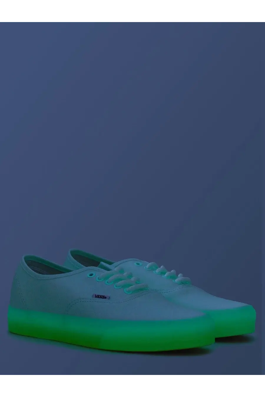 Vans men’s authentic sneaker white with white canvas upper and vibrant neon green glow-in-the-dark rubber sole