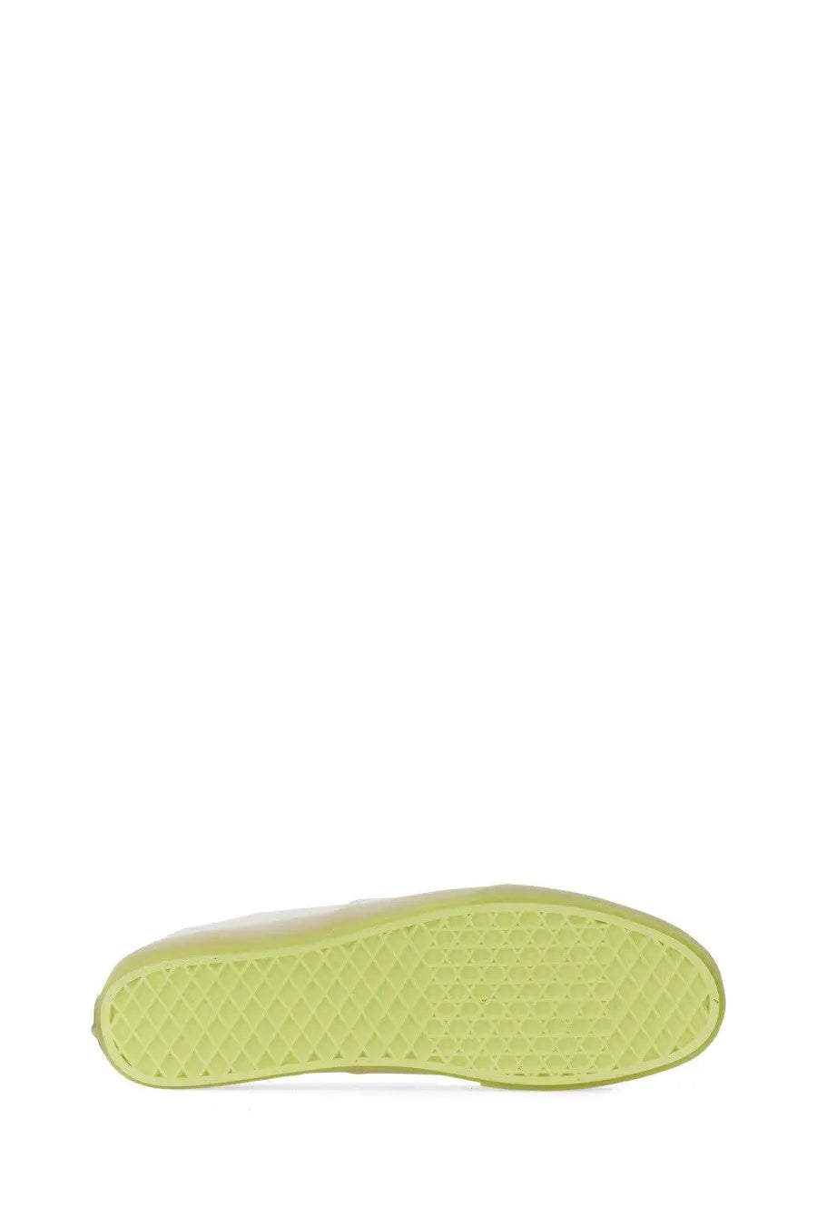 A lime green rubber sole with diamond tread on the back of vans men’s authentic sneaker white