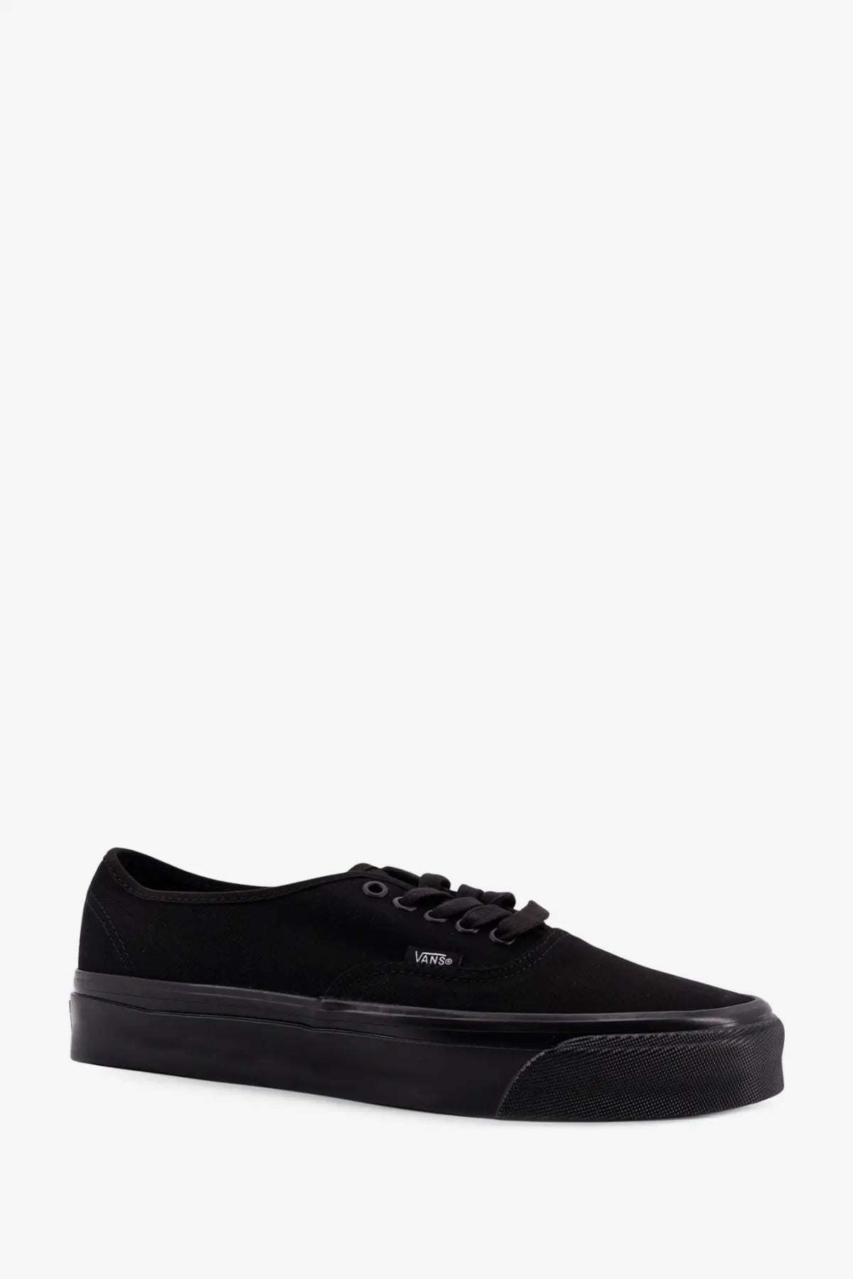 Vans men’s LX Authentic Reissue canvas sneakers in black with rubber sole and Vans logo on the side