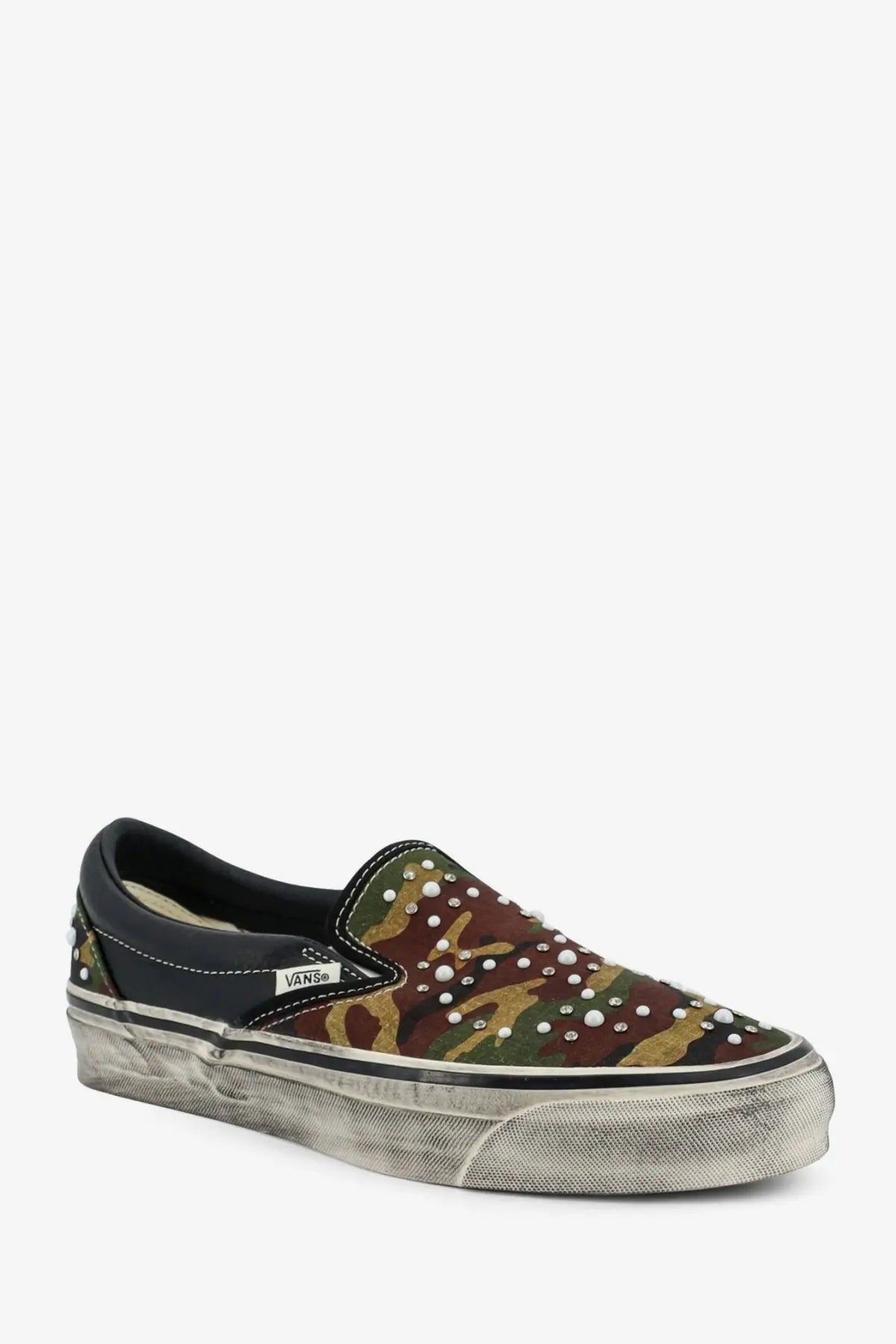Vans men’s lx classic slip on canvas and leather sneaker in black with camouflage pattern pearl studs and distressed sole