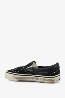 Vans men’s lx classic slip-on sneaker in black suede with silver studs and a distressed white rubber sole