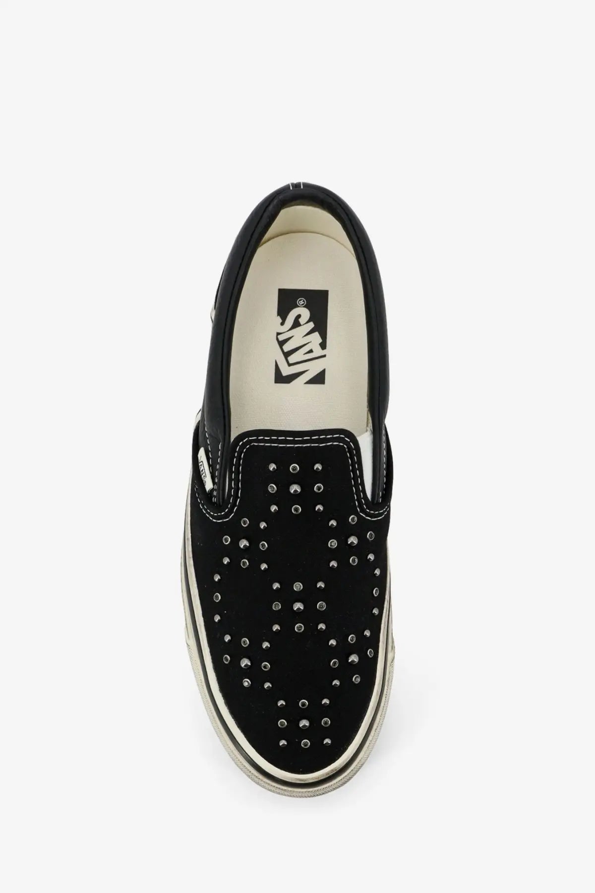 Vans men’s lx classic slip on black suede sneaker with silver stud skull design in leather and canvas materials
