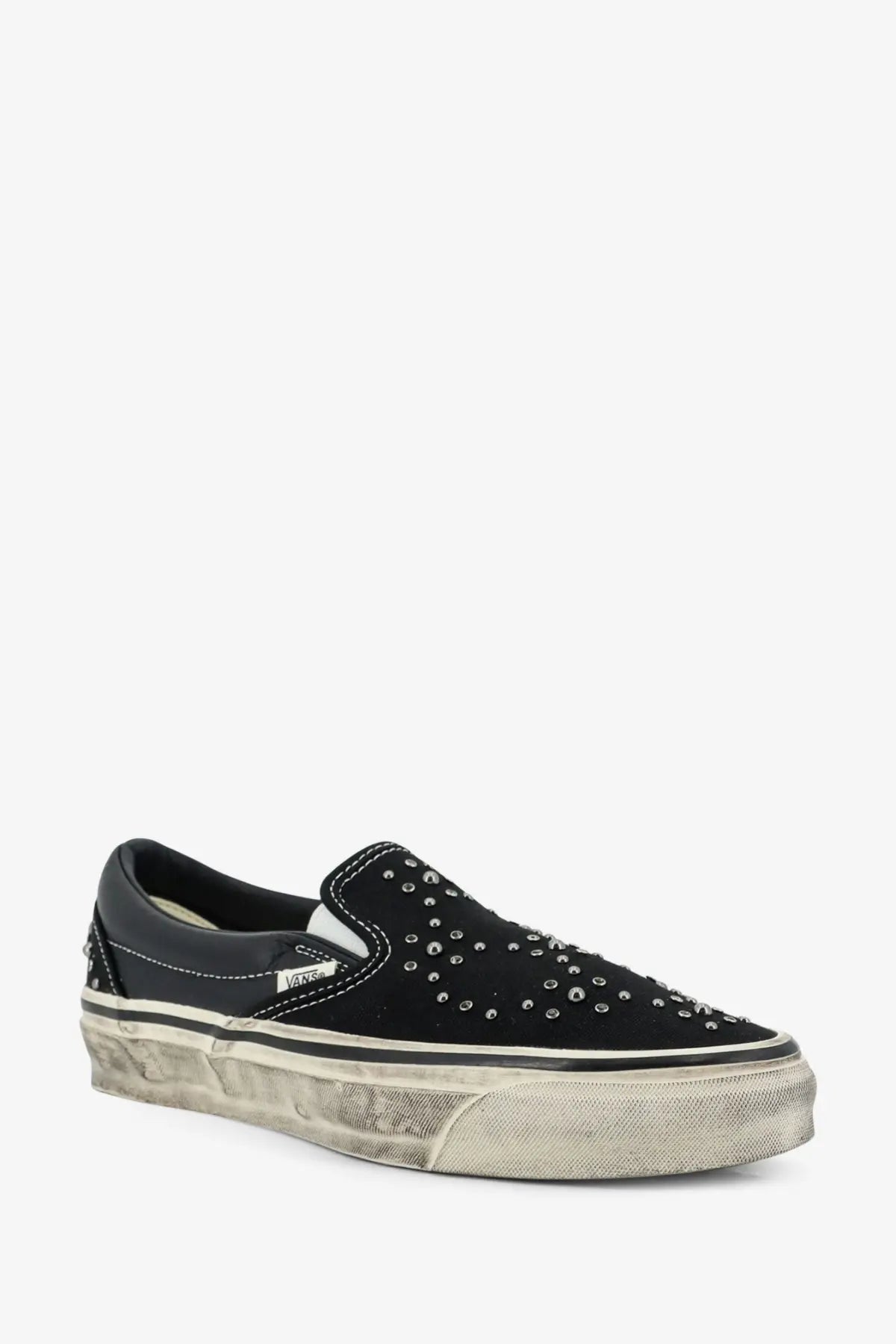 Black suede vans men’s lx classic slip-on sneaker with silver studs and distressed rubber sole