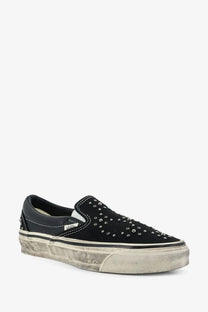 Black suede vans men’s lx classic slip-on sneaker with silver studs and distressed rubber sole